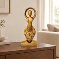 Statua dea color rame